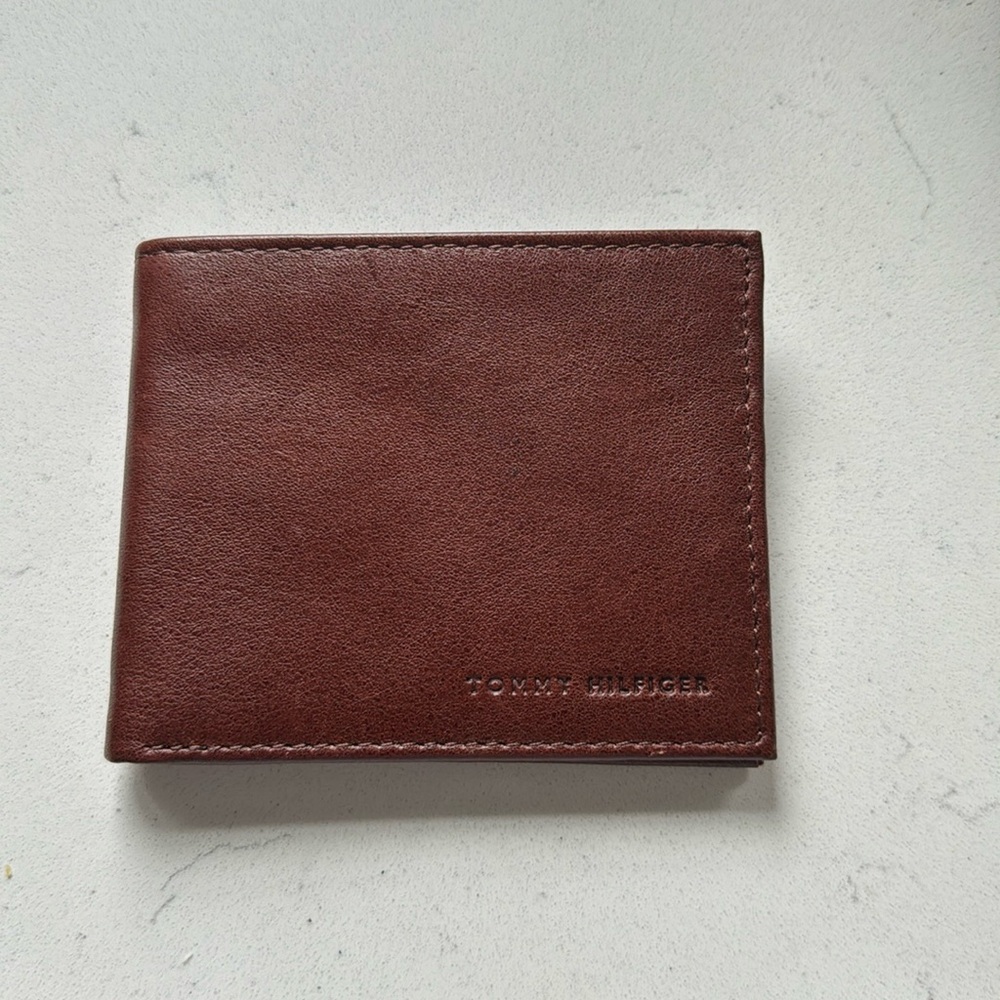 Tommy Hilfiger leather RFID-protected wallet. Never been used!